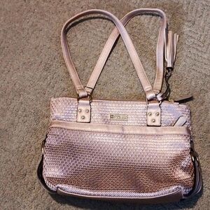 A pink stone mountain pocket bag